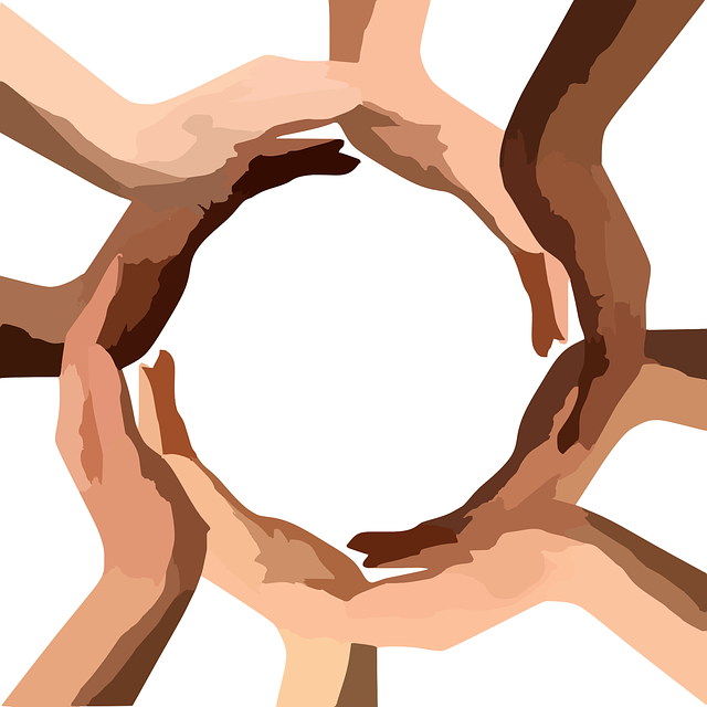 different colored hands in a circle
